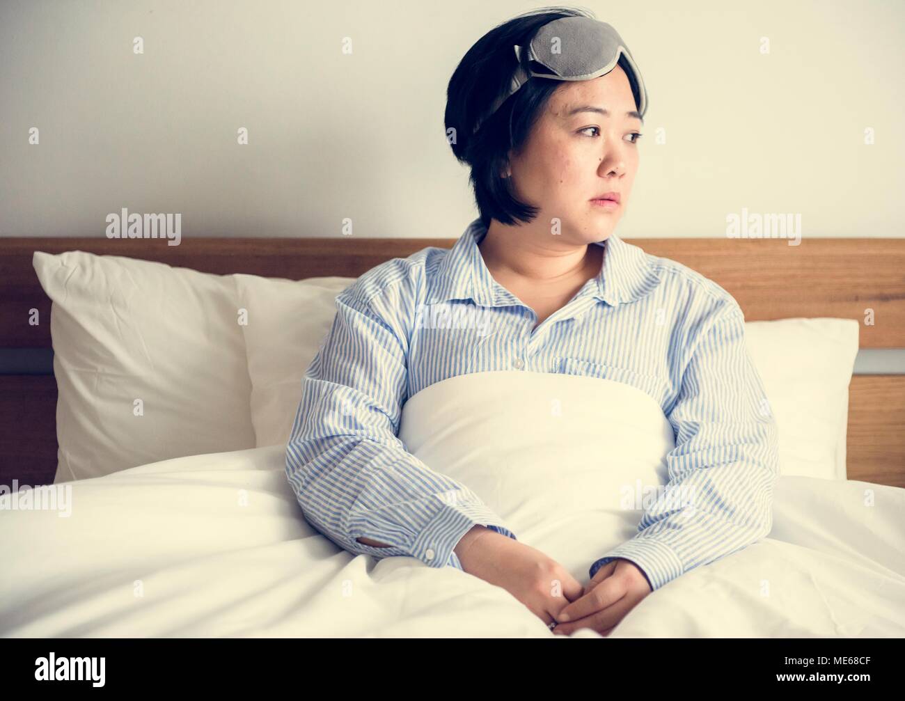 A woman waking up Stock Photo