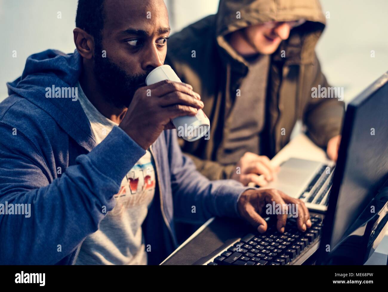 African descent man working with computer laptop Stock Photo