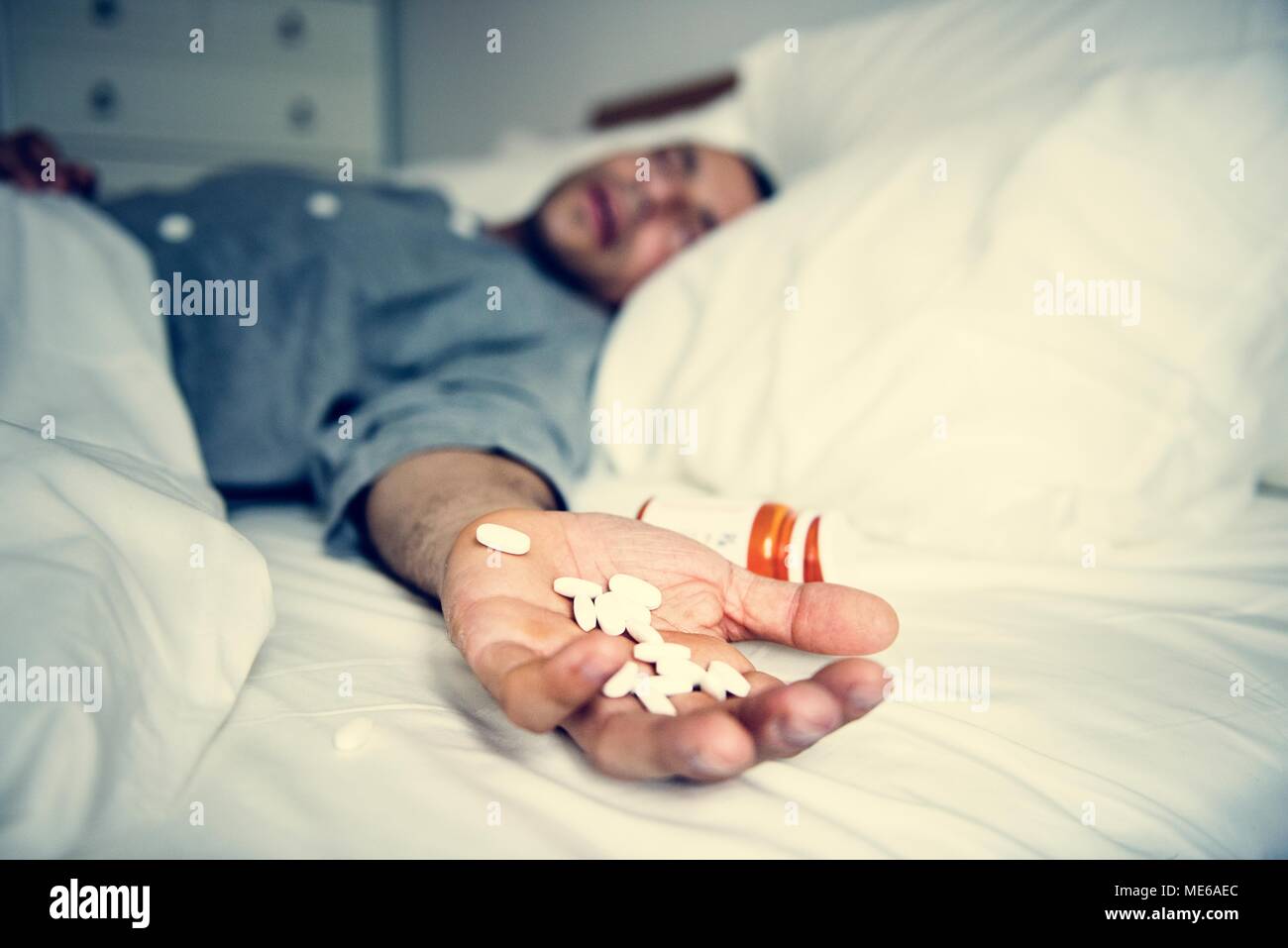 Man overdosed with medicine Stock Photo