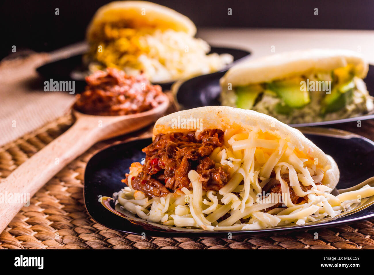 Different types of arepas, meat, black beans, cheese, typical South