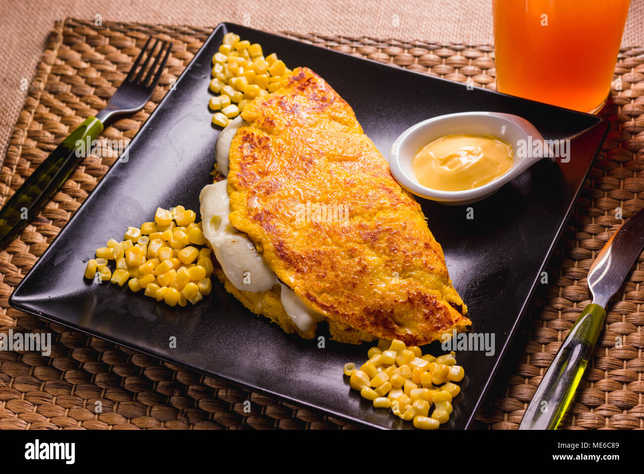 Cachapa, corn tortilla with cheese and butter Stock Photo