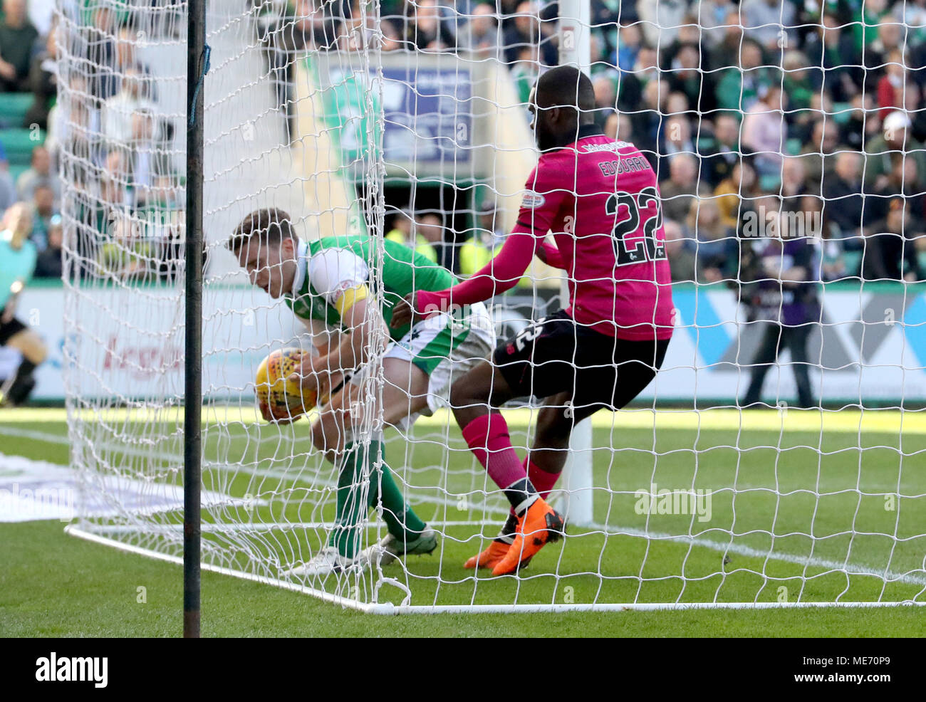 Hibernian's Paul Hanlon grabs the ball after Celtic's Odsonne Edouard scored his sides first goal during the Ladbrokes Scottish Premiership match at Easter Road, Edinburgh. Stock Photo