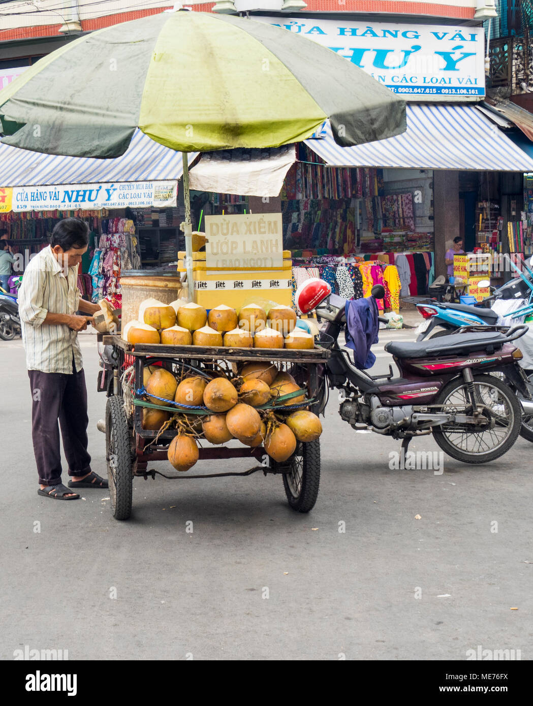 Man in coconut vendor in hires stock photography and images Alamy