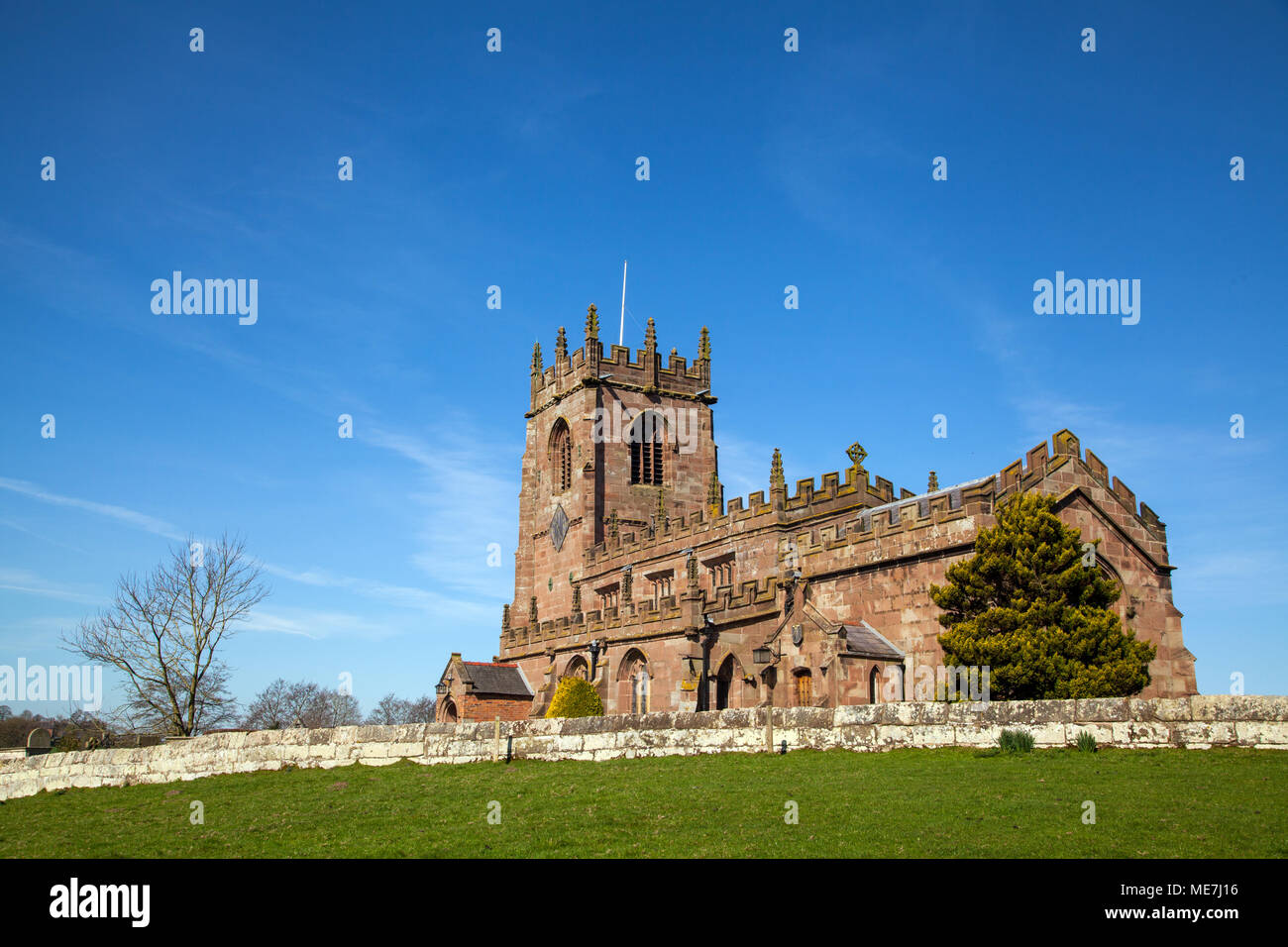 The Parish church of St Michael's in the South Cheshire village of Marbury standing in rolling Cheshire countryside and farmland Stock Photo
