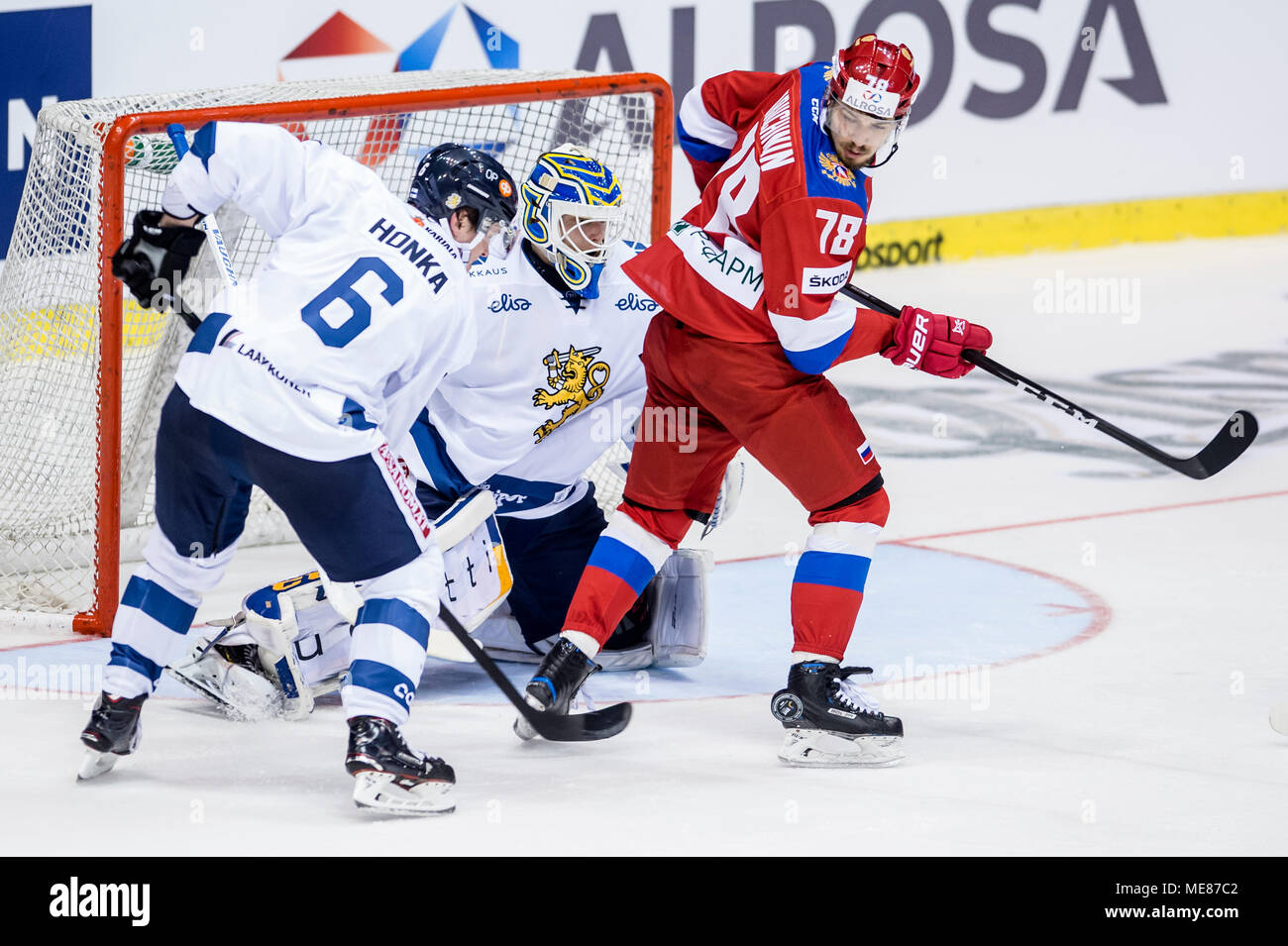 Pardubice, Czech Republic. 21st Apr, 2018. L-R Julius Honka and goalkeeper Ville Husso (both FIN) and Alexei Kruchinin (RUS) in action during the Carlson Hockey Games ice hockey tournament, part of Euro Hockey Tour (EHT) series: Russia vs Finland in Pardubice, Czech Republic, April 21, 2018. Credit: David Tanecek/CTK Photo/Alamy Live News Stock Photo