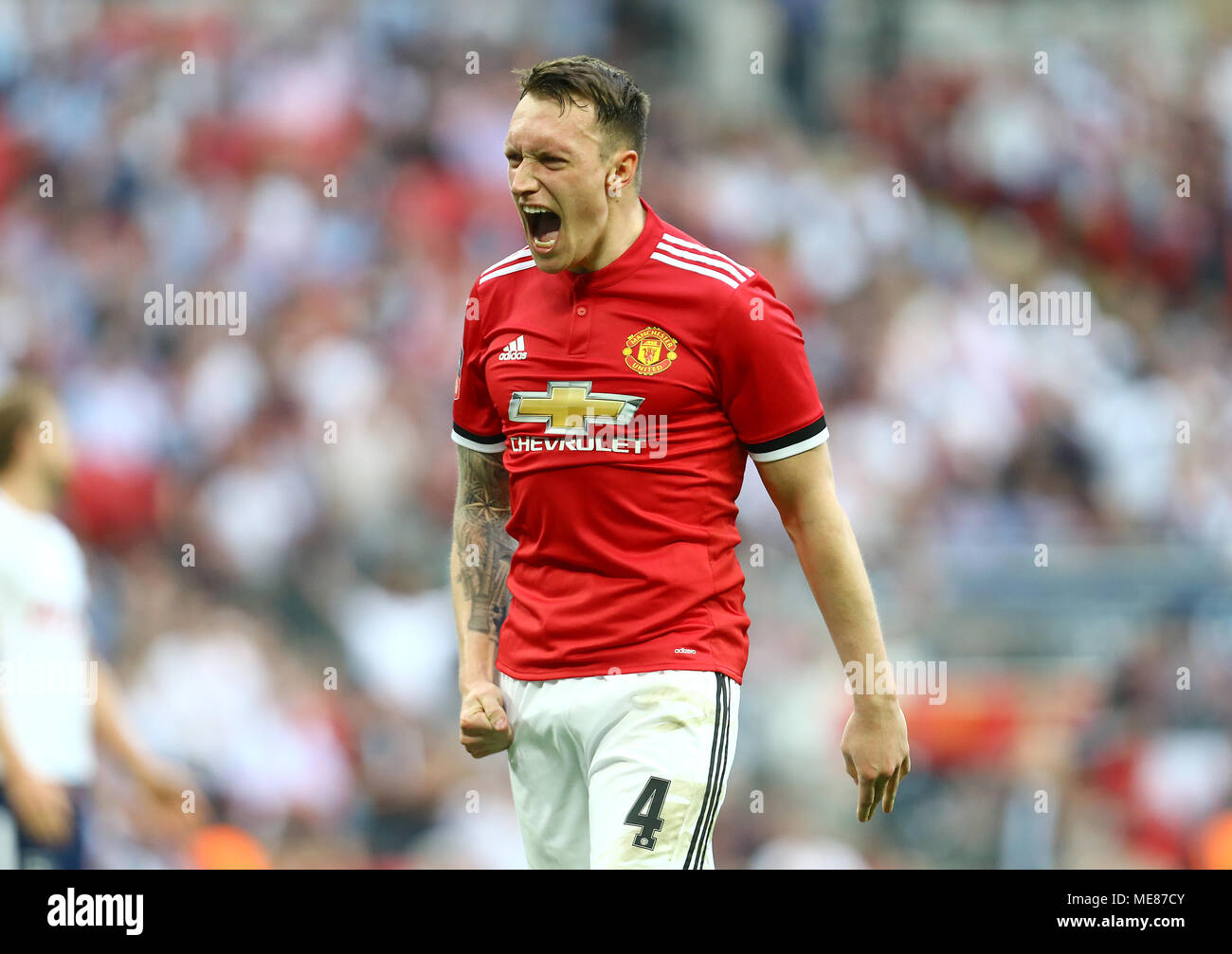Phil Jones of Manchester United celebrates the victory against Tottenham Hotspur after during the FA Cup Semi Final match between Manchester United and Tottenham Hotspur at Wembley Stadium on April 21st 2018 in London, England. (Photo by Leila Coker/phcimages.com) Stock Photo