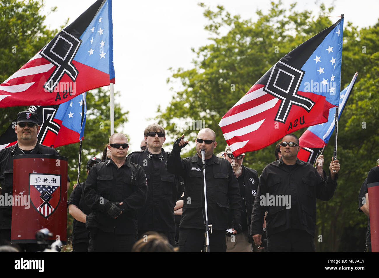 Newnan, Georgia, USA. 21st Apr, 2018. White Supremacist Members of National Socialist Movement gathered in Greenville Street Park for a rally in town of Newnan, GA on Saturday April 21, 2018.4/21/2018.Newnan, Georgia.Go Nakamura/Zuma Wire Credit: Go Nakamura/ZUMA Wire/Alamy Live News Stock Photo