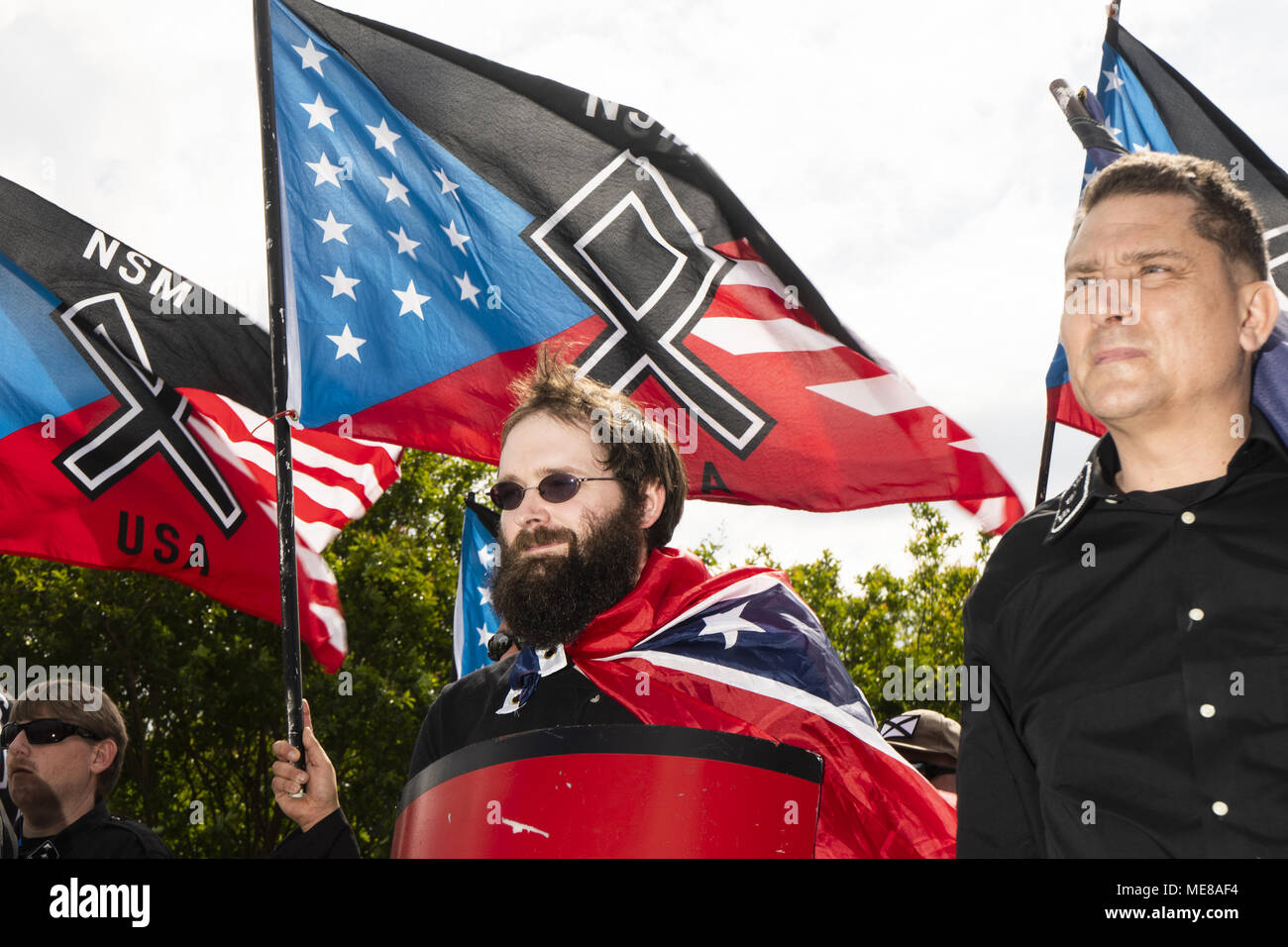 Newnan, Georgia, USA. 21st Apr, 2018. White Supremacist Members of National Socialist Movement gathered in Greenville Street Park for a rally in town of Newnan, GA on Saturday April 21, 2018.4/21/2018.Newnan, Georgia.Go Nakamura/Zuma Wire Credit: Go Nakamura/ZUMA Wire/Alamy Live News Stock Photo