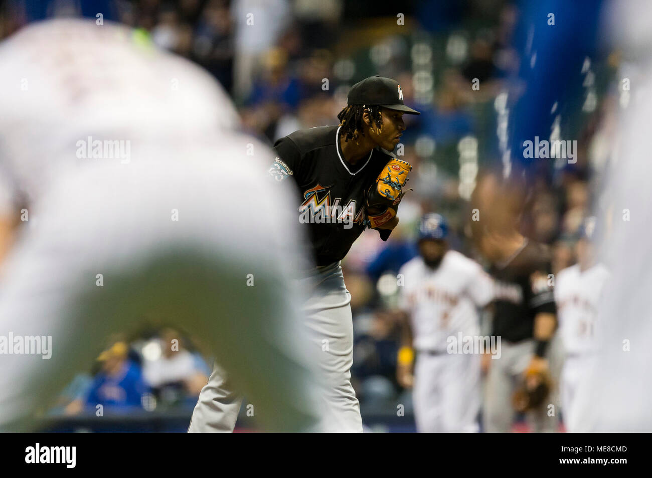 Milwaukee, WI, USA. 21st Apr, 2018. Miami Marlins starting pitcher Jose Urena #62 with runners on first and third base during the Major League Baseball game between the Milwaukee Brewers and the Miami Marlins at Miller Park in Milwaukee, WI. John Fisher/CSM/Alamy Live News Stock Photo
