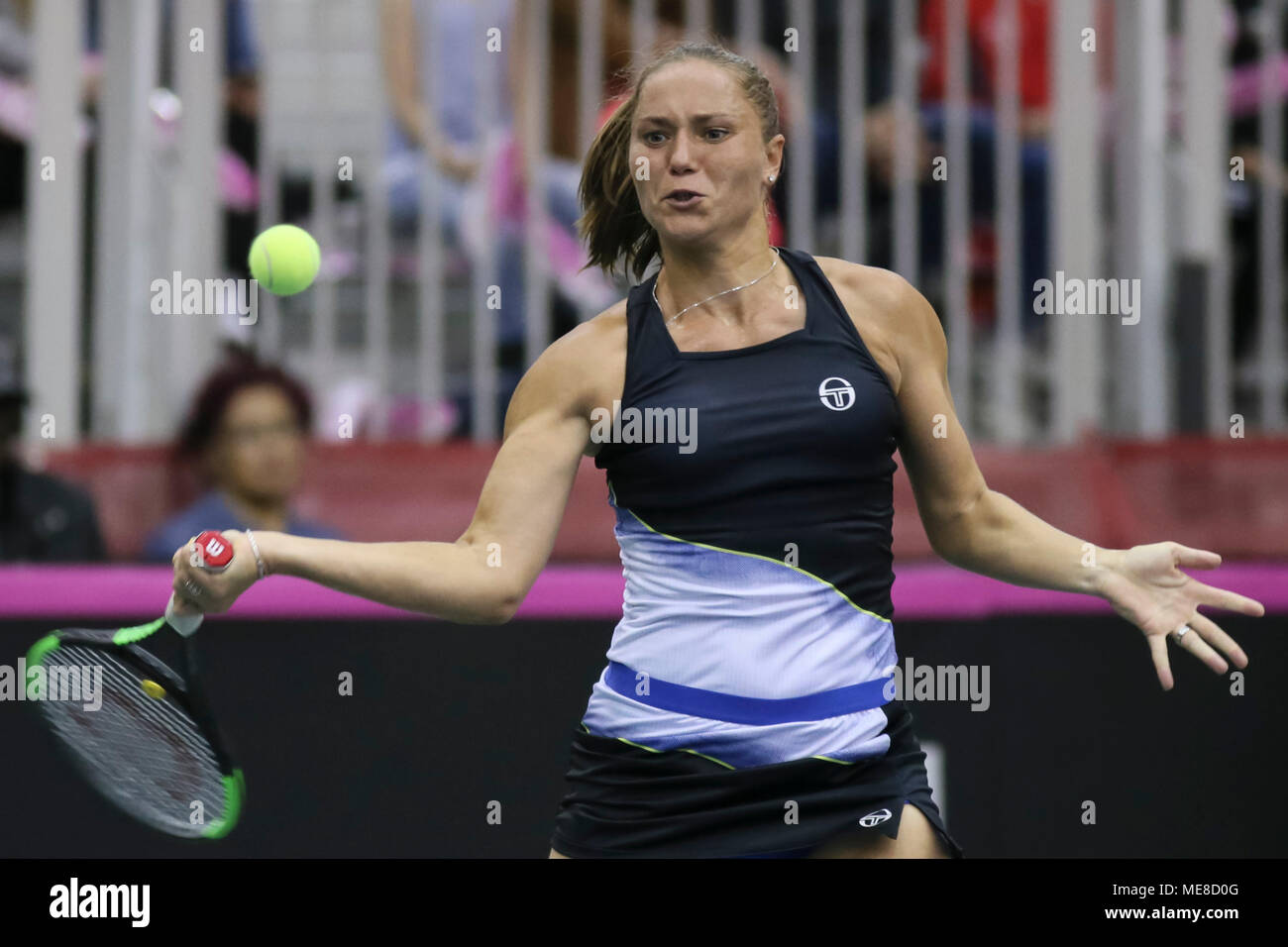 Montreal, Canada, 21 April 2018. Kateryna Bondarenko of the Ukraine hits a return against Eugenie Bouchard of Canada during their Fed Cup World Group II play-off tennis match in Montreal, Quebec, Canada on Saturday, April 21, 2018. Credit: Dario Ayala/Alamy Live News Stock Photo