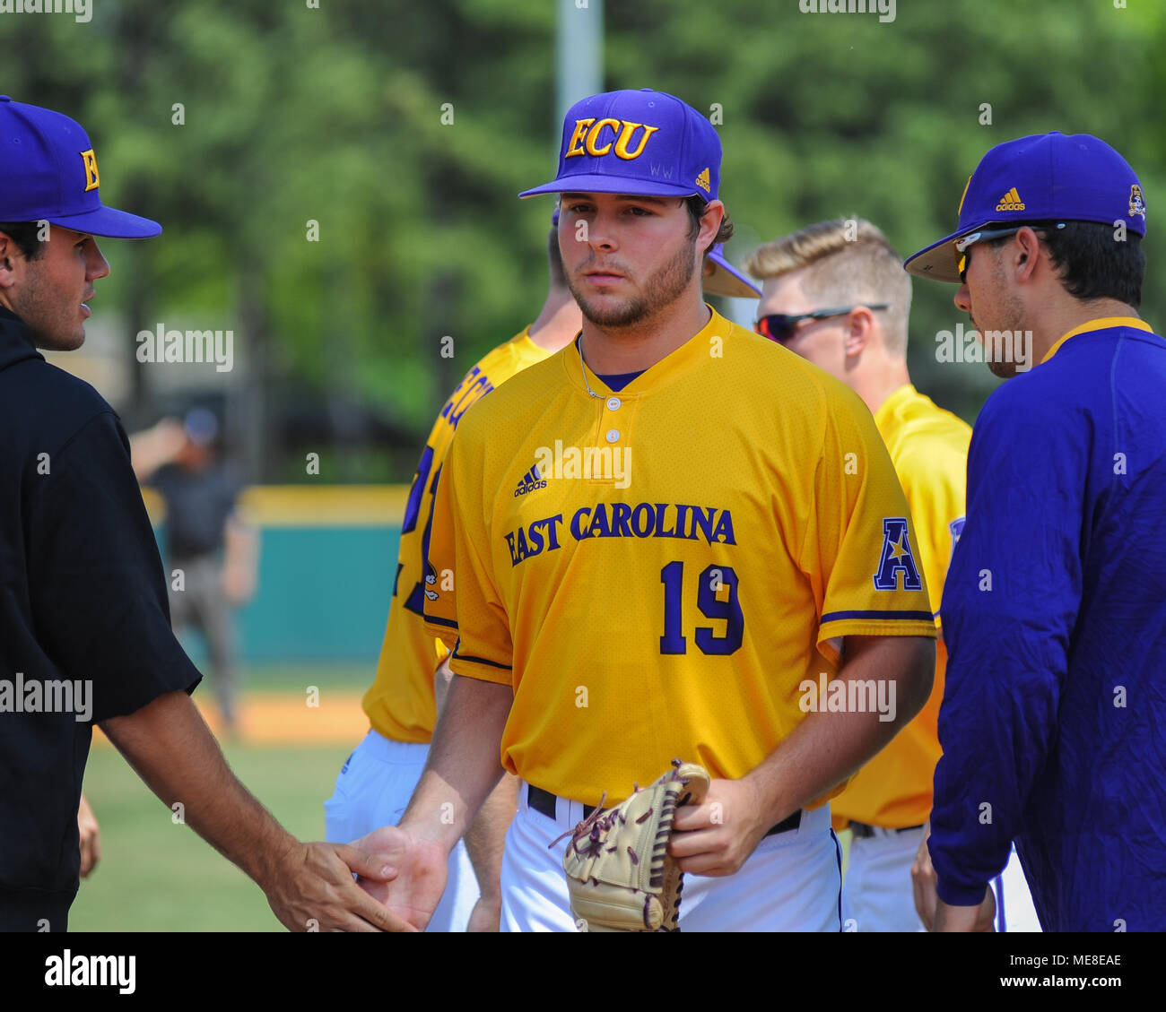 Win The Series. 21st Apr, 2018. TN, USA; Pirates pitcher, Alec Burleson  (19), is congratulated by teammates during the match with Memphis. The ECU  Pirates defeated Memphis, 4-2, at FedEx Park to