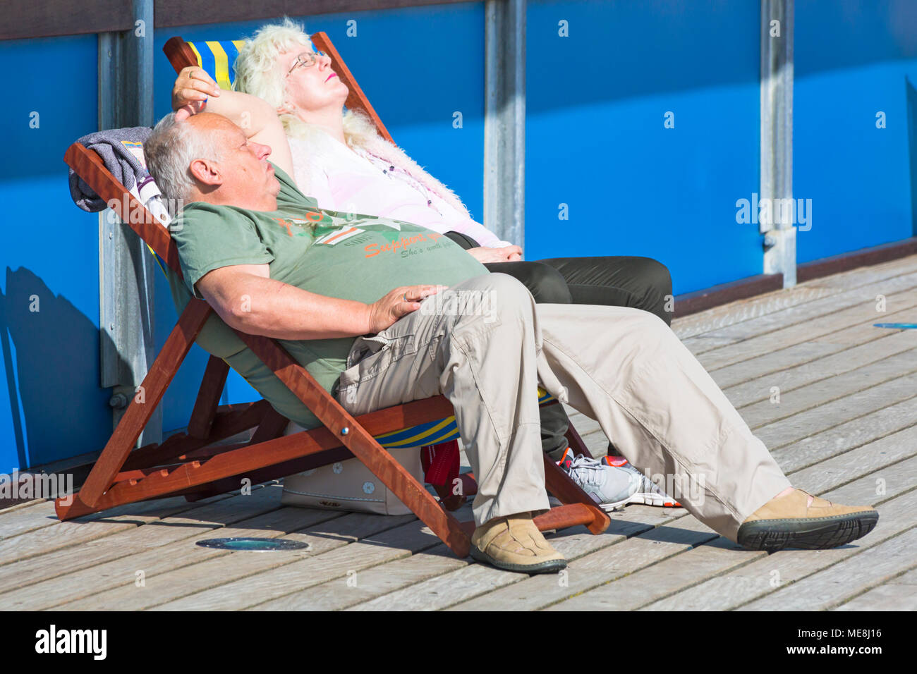 Mature Couple Relaxing In Deckchairs Hi Res Stock Photography And