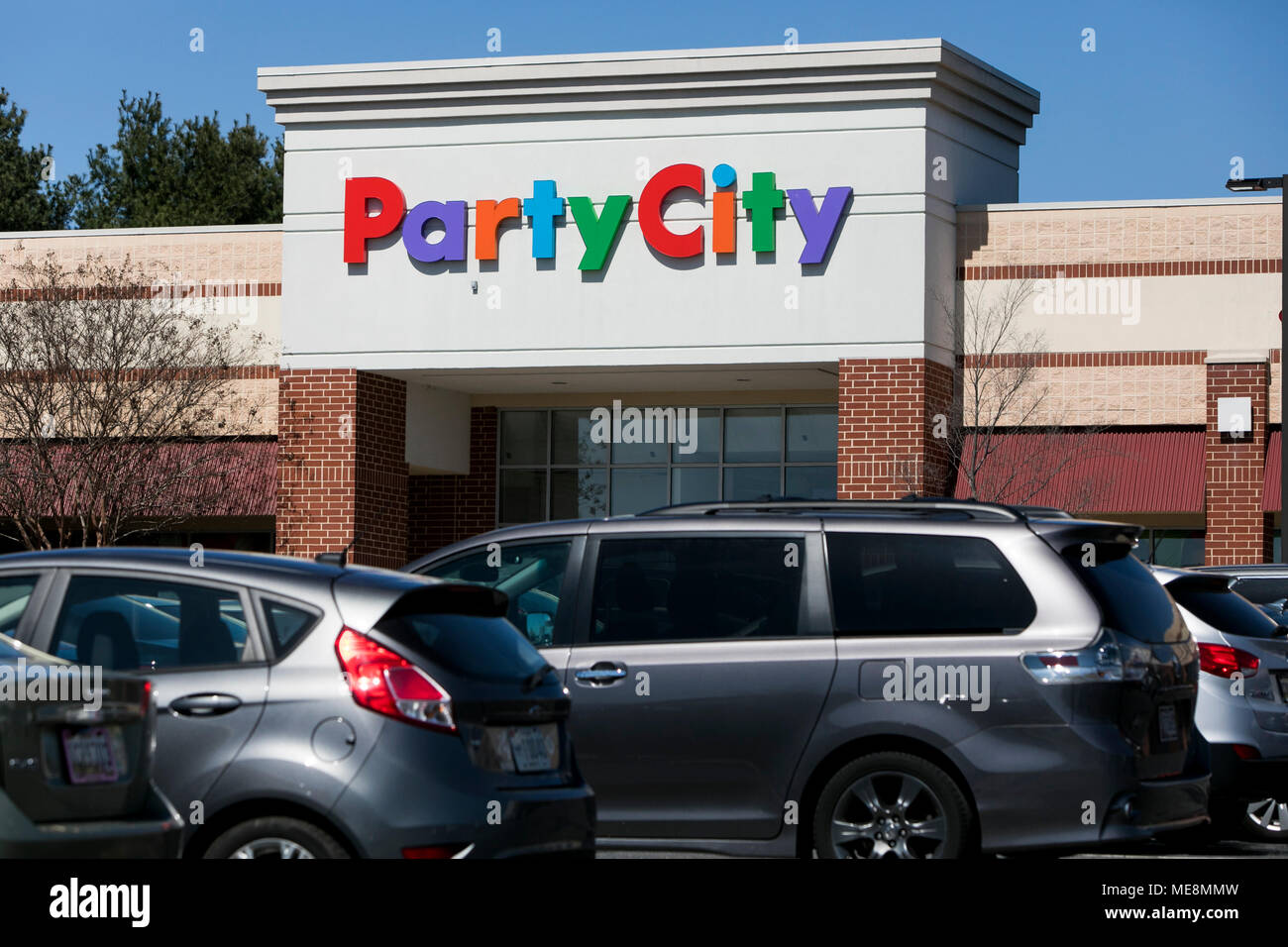A logo sign outside of a Party City retail store location in Columbia, Maryland on April 20, 2018. Stock Photo