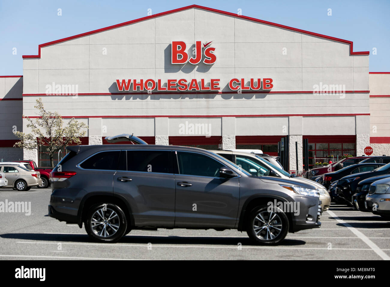 A logo sign outside of a BJ's Wholesale Club retail store location in Columbia, Maryland on