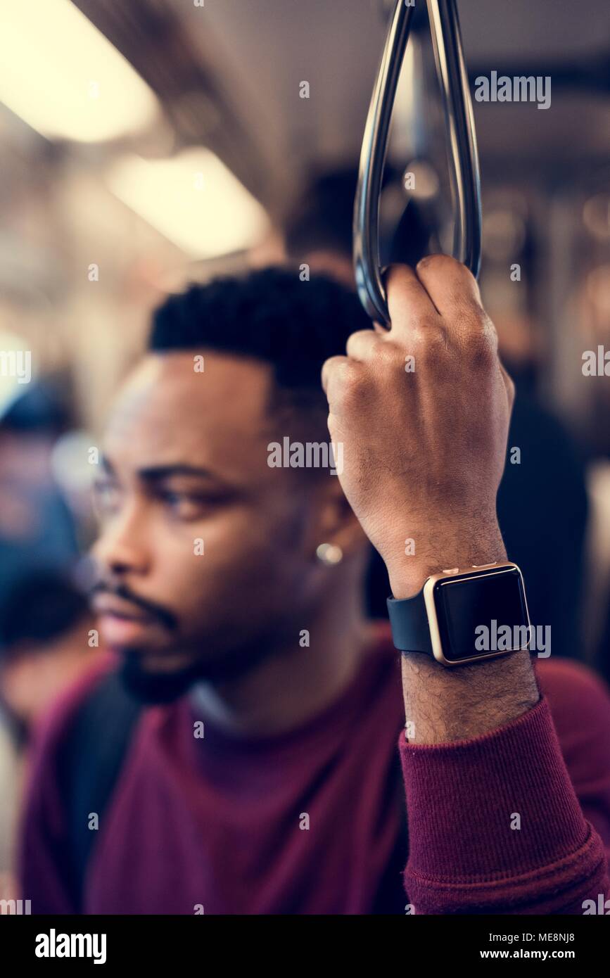 African man on a train Stock Photo