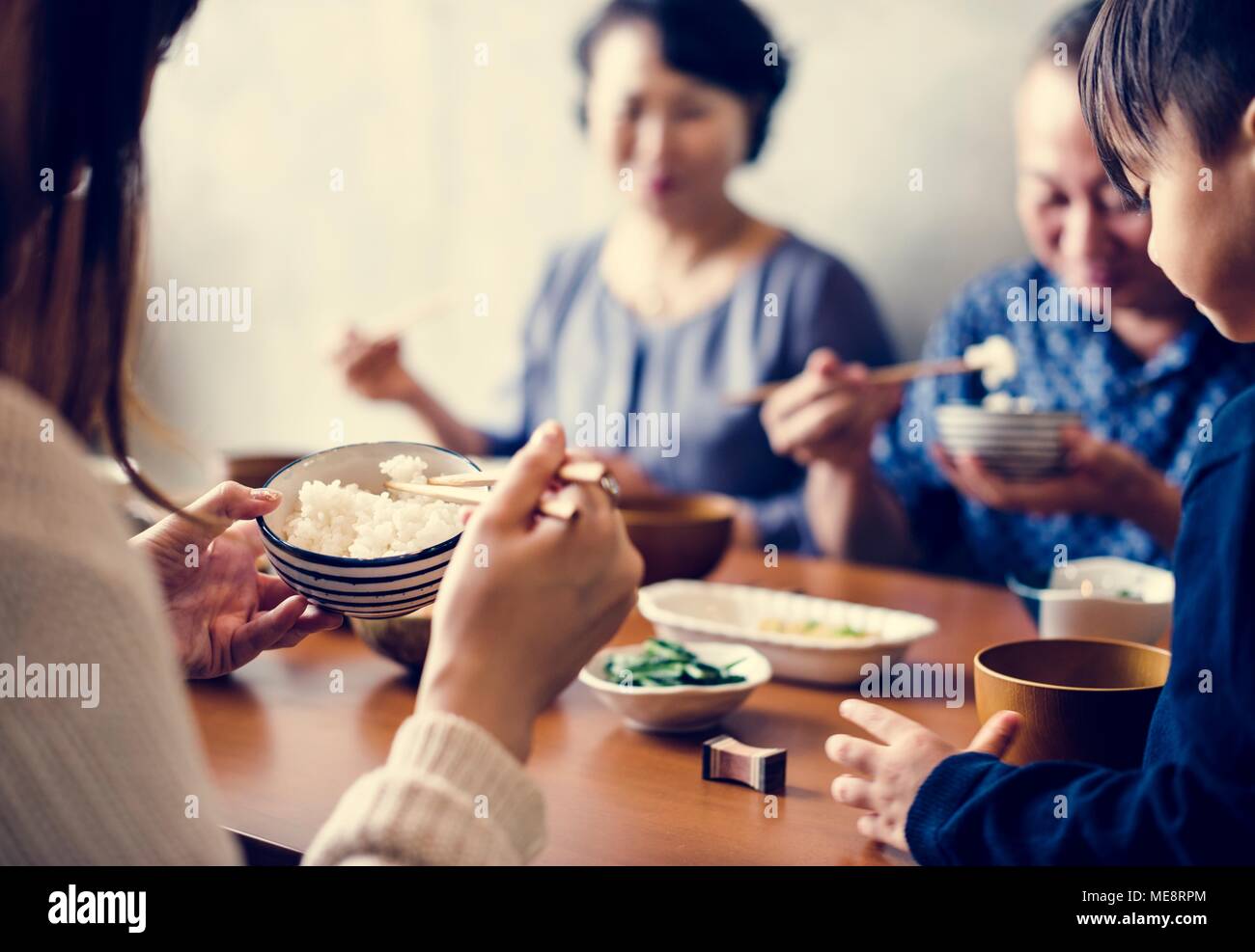 Japanese family eating Stock Photo