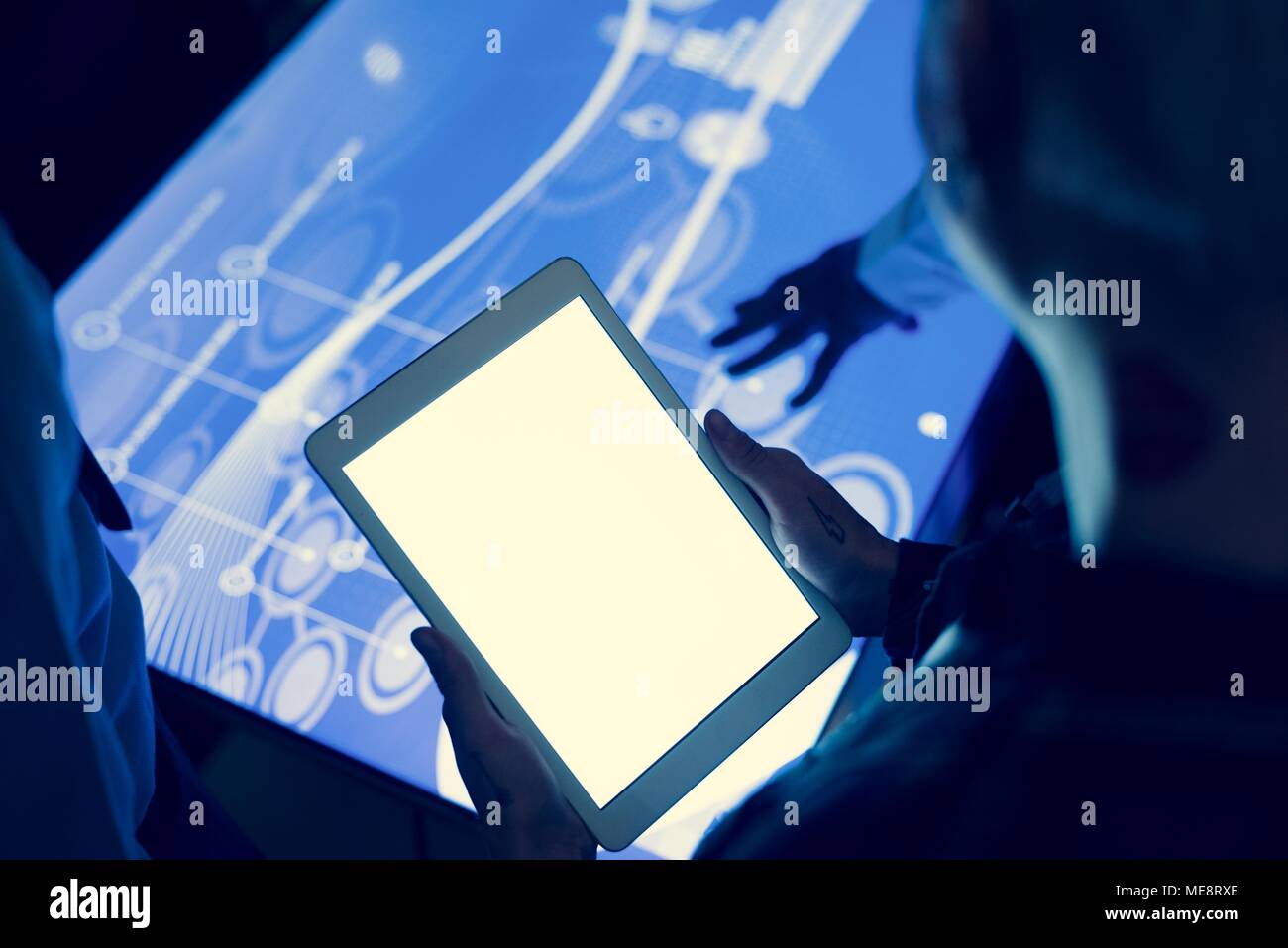 Hands holding using tablet in technologiy meeting Stock Photo