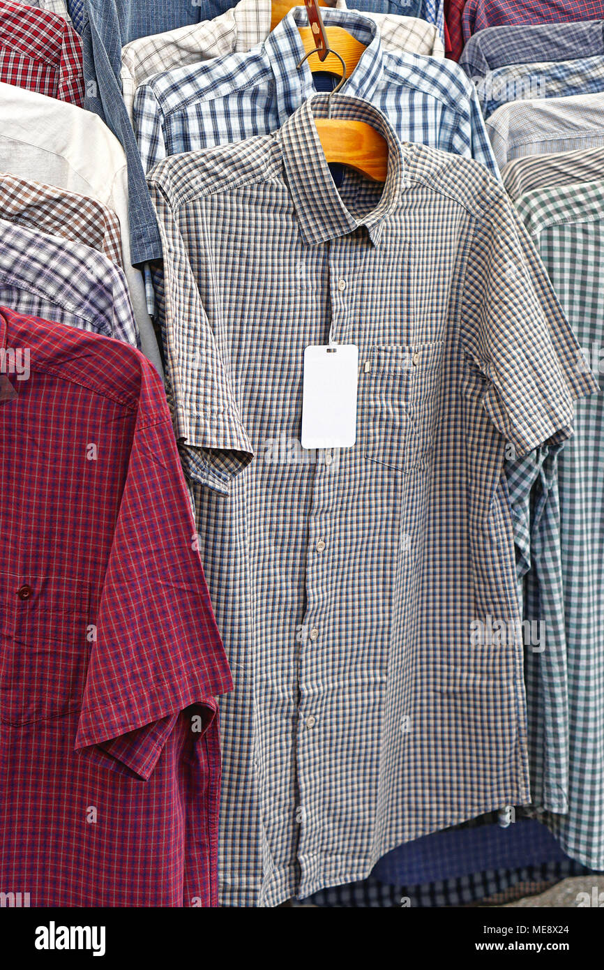 Short sleeve casual shirts at hangers Stock Photo