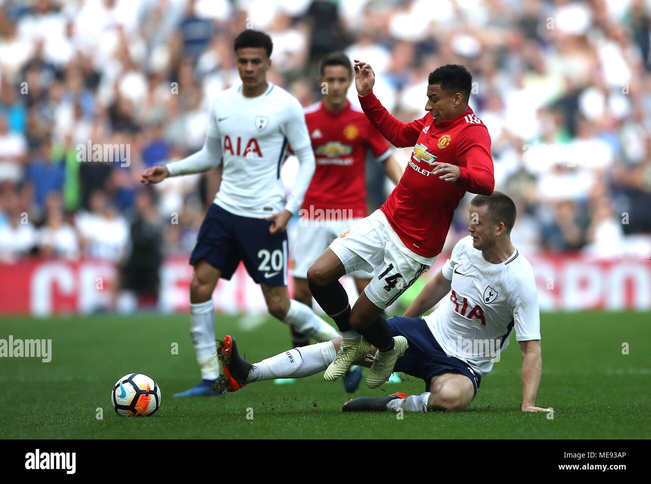 Manchester Uniteds Jesse Lingard (second right) battle for the ball with Tottenham Hotspurs Eric Dier (right) during the Emirates FA Cup semi-final match at Wembley Stadium, London