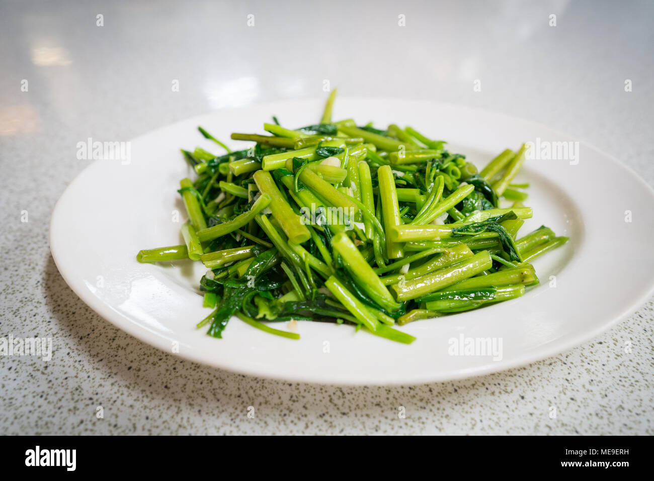Stir Fry Water Spinach or Kang Kong Stock Photo