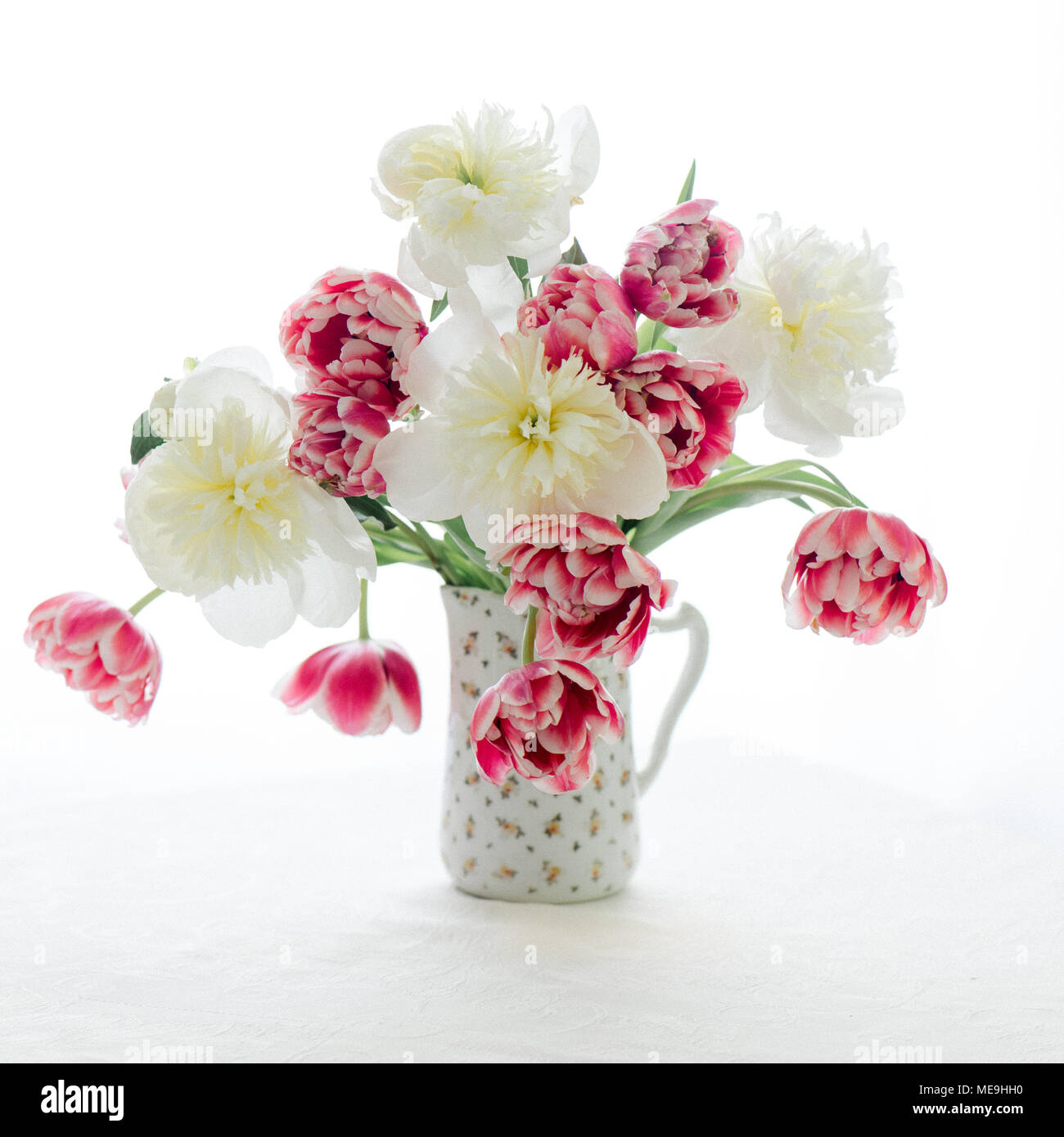 Tulips and Peonies in a pitcher Stock Photo Alamy