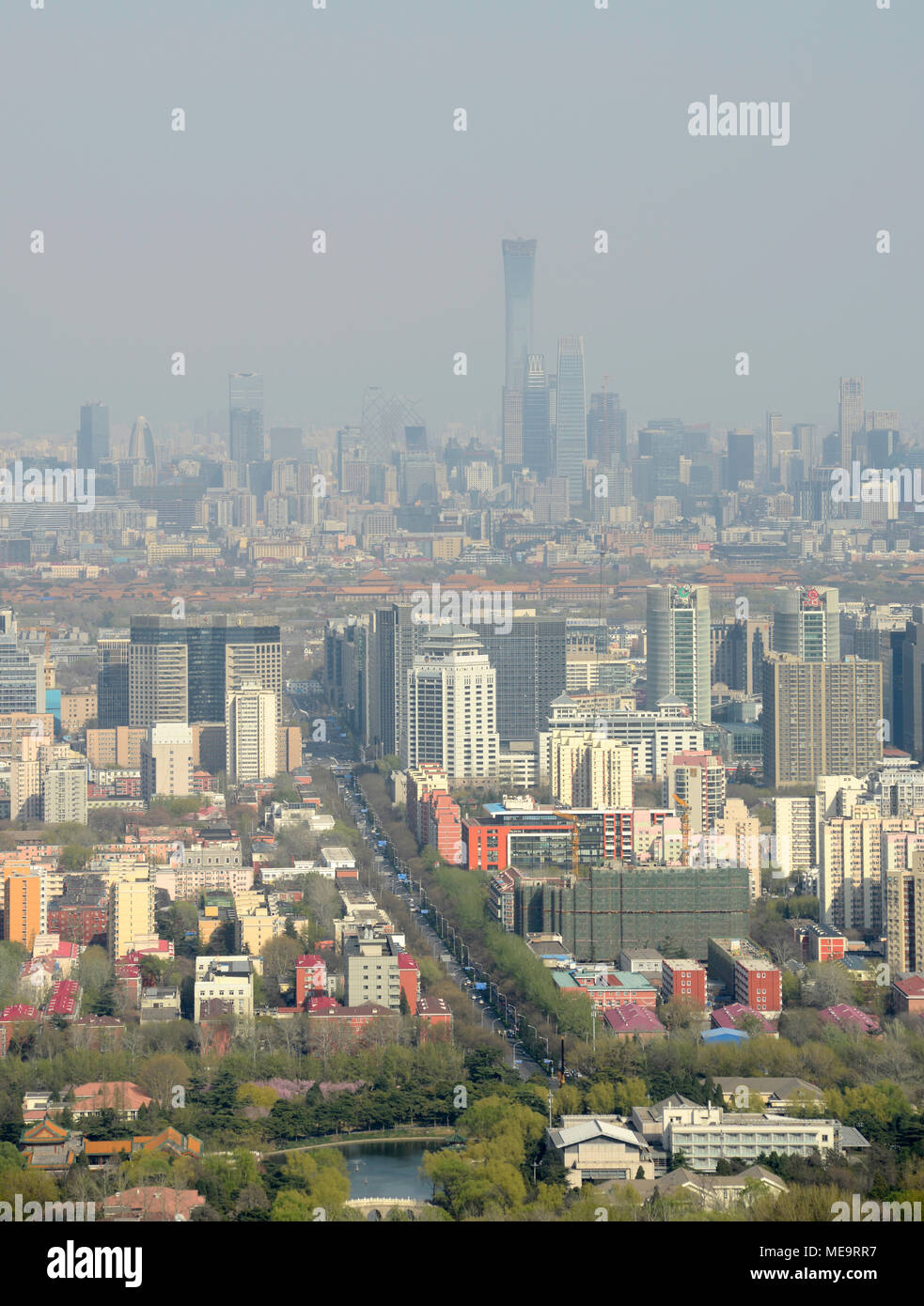 View over Beijing looking east from the China Central Television tower, Beijing, China, with China Zun tower prominent in the CBD in the distance Stock Photo