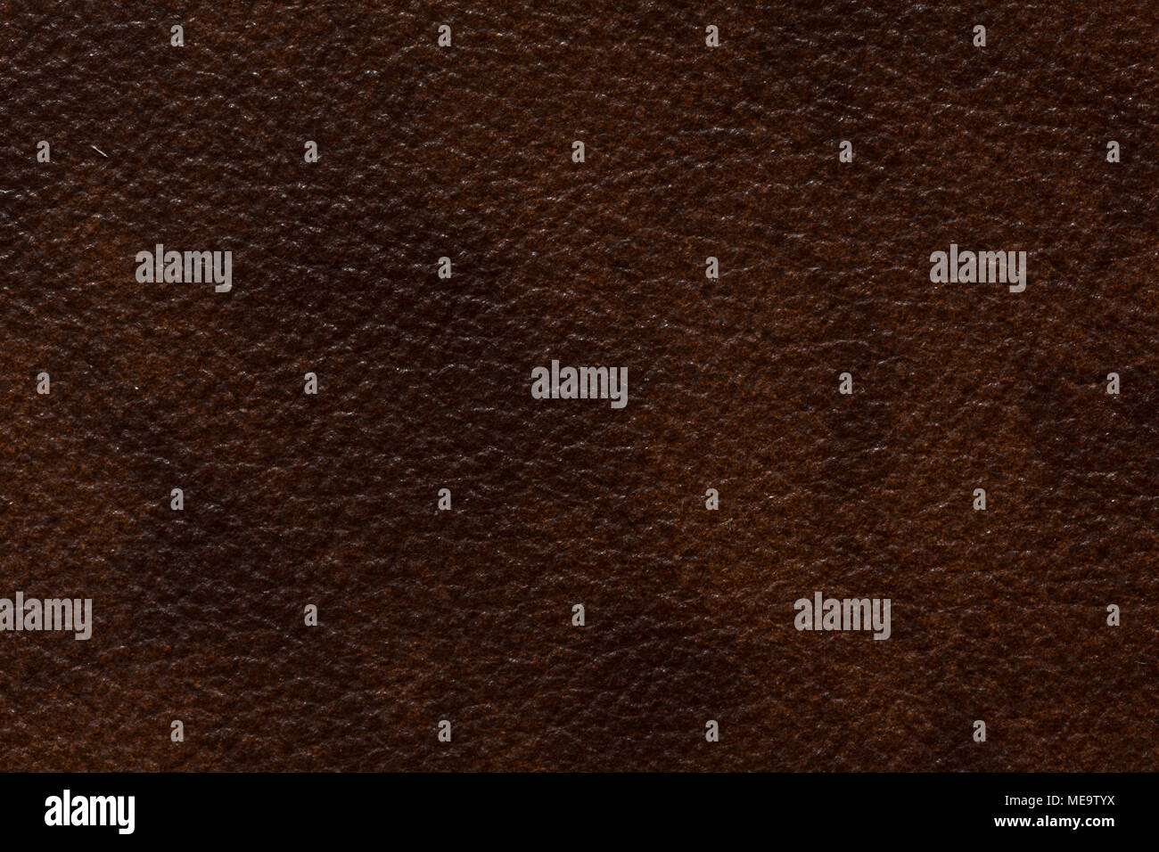 Extraordinary leather background in saturated brown tone. Stock Photo