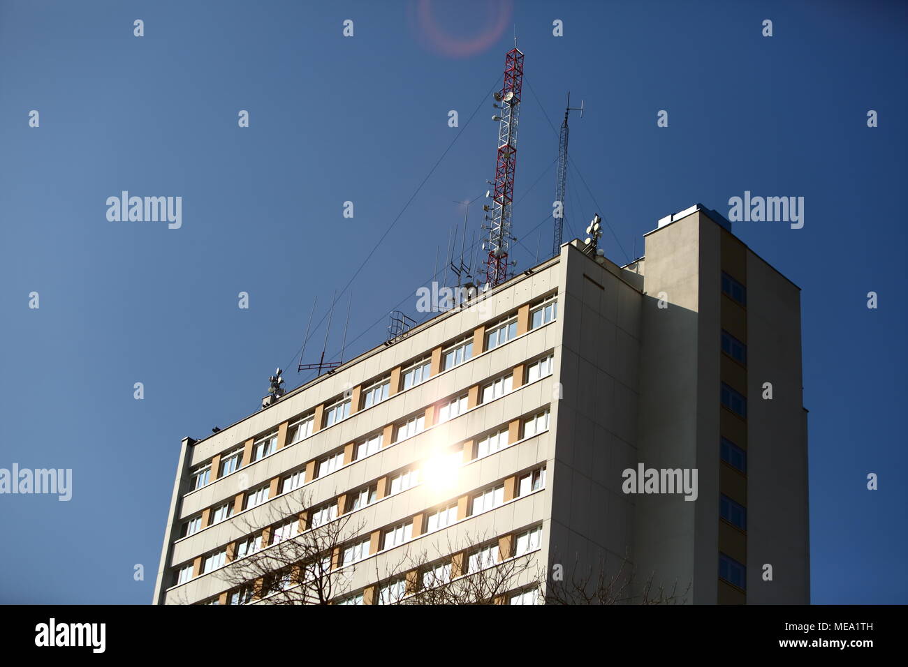 A huge skyscraper with an antenna placed on top of it appears in the ...