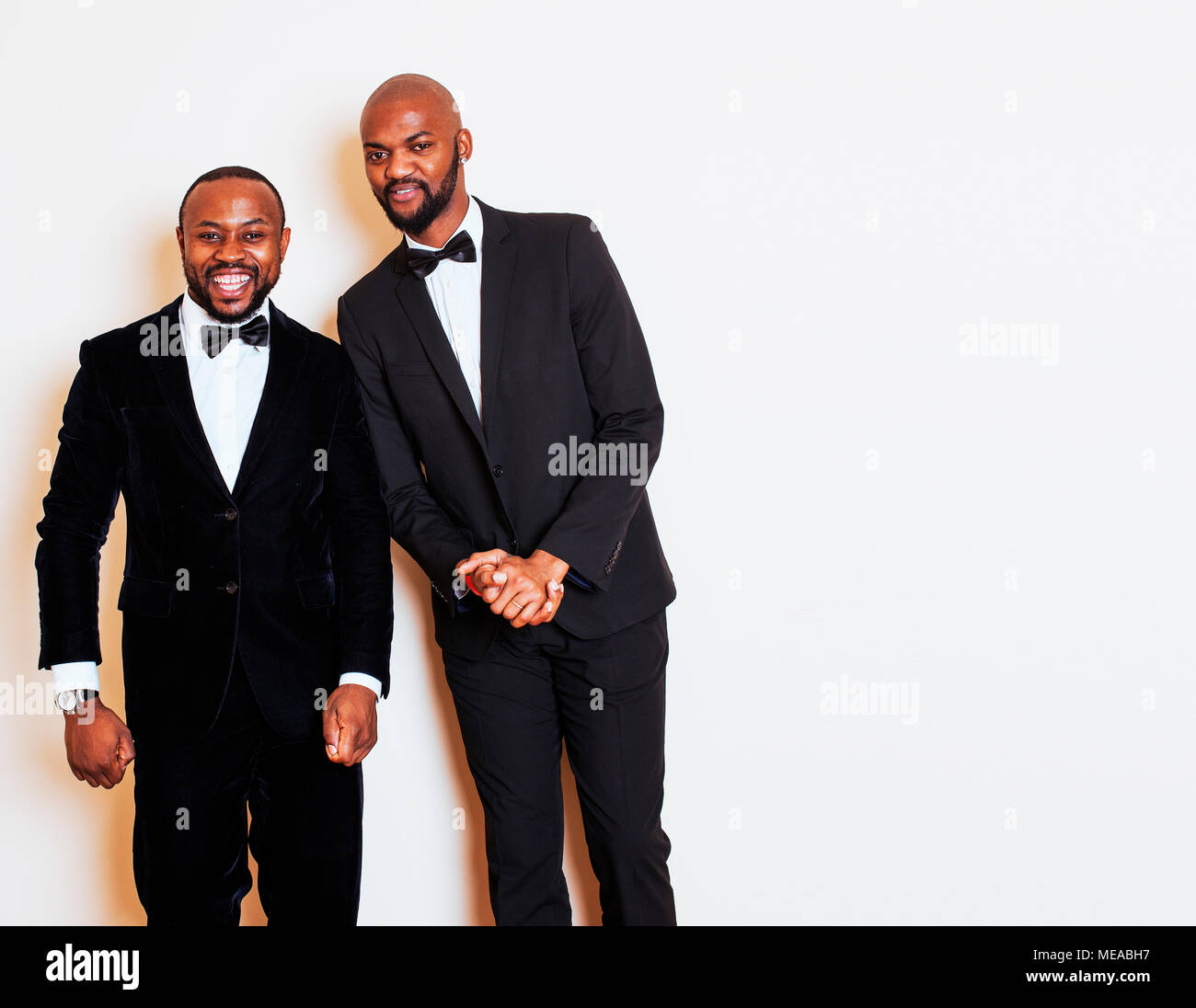 two afro-american businessmen in black suits emotional posing, g Stock ...