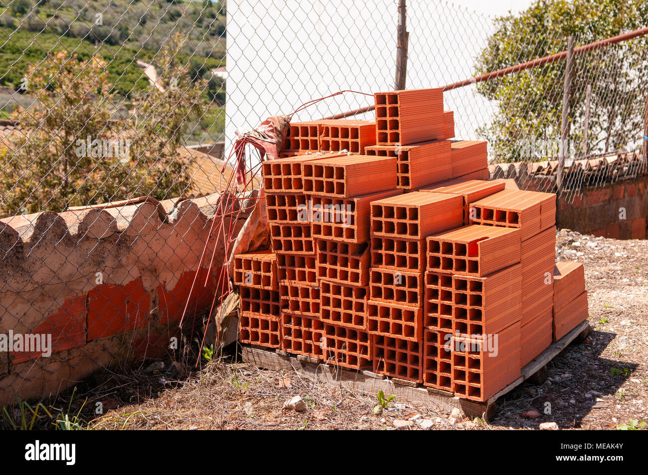 Red terracotta building bricks, typically used in Portugal. Stock Photo