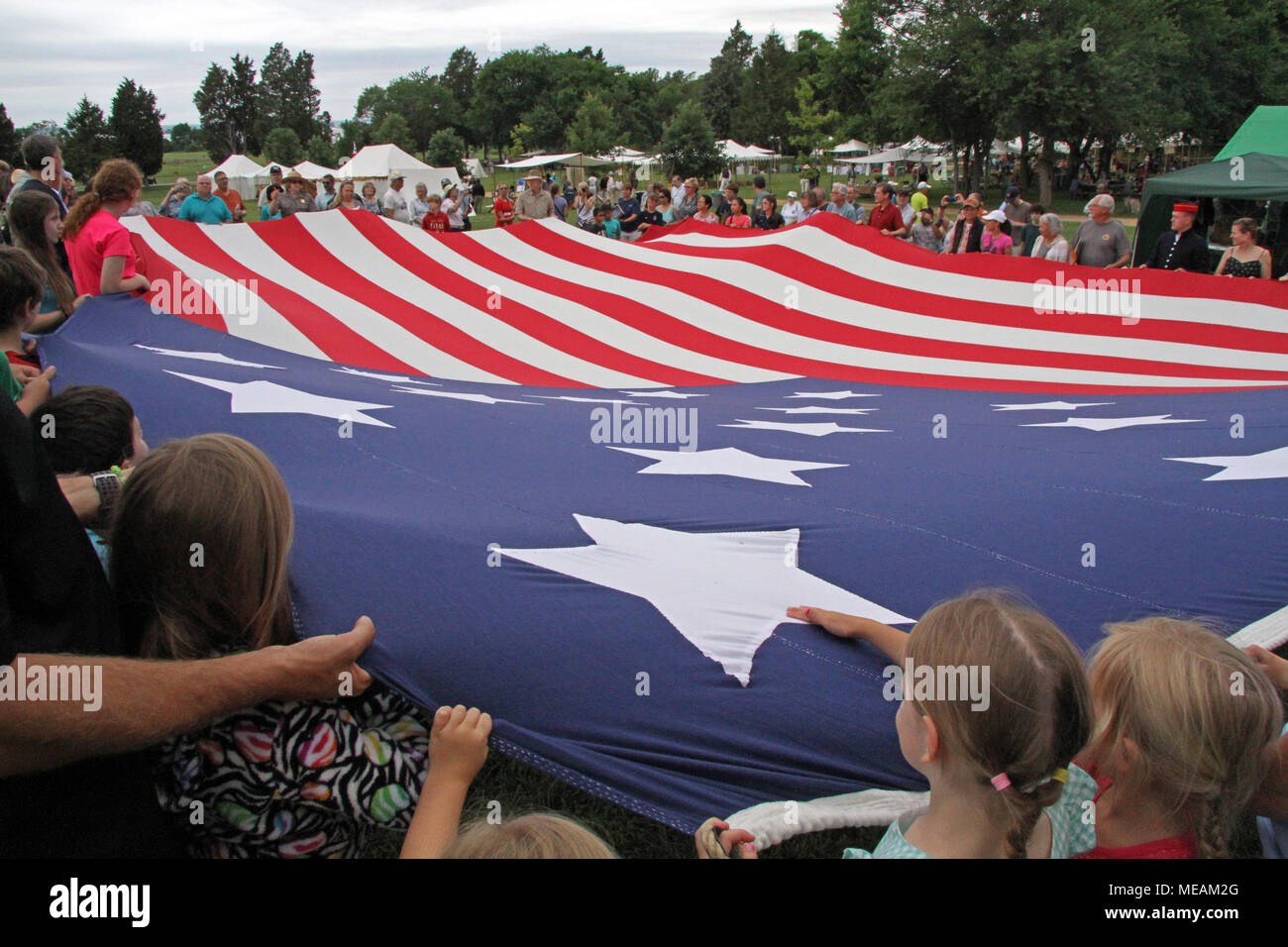 educational program of full scale replica of Star-Spangled Banner being unfolded at War of 1812 celebration Stock Photo