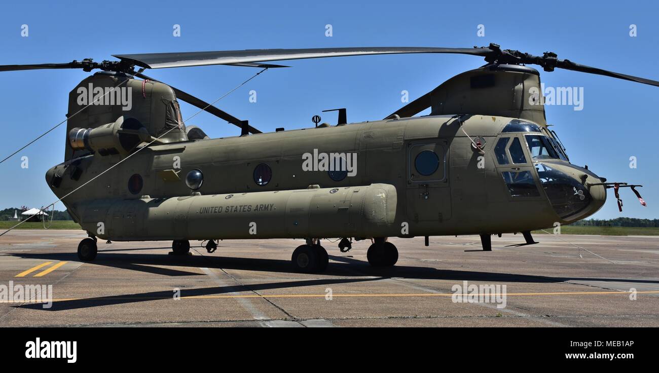 A green U.S. Army CH-47 Chinook transport helicopter on the runway at Columbus Air Force Base. Stock Photo
