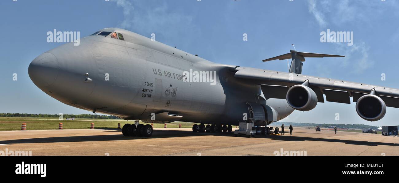 A U.S. Air Force C-5 Galaxy cargo plane on a runway at Columbus Air Force Base. This C-5 belongs to 436th Airlift Wing and 512th Airlift Wing Stock Photo