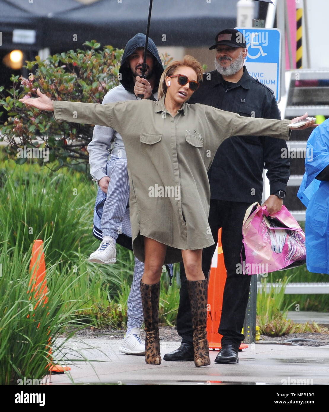 Mel B Embraces The Rain With Her New Short Hairdo As She Arrives