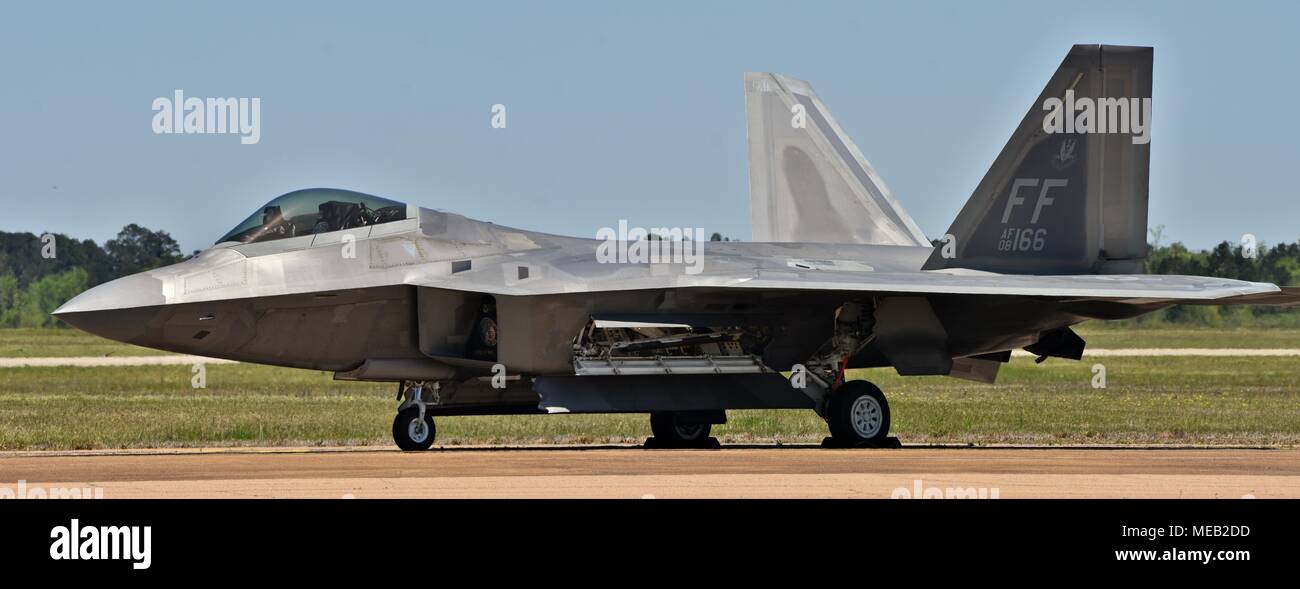An Air Force F-22 Raptor on the runway at Columbus Air Force Base. This F-22 belongs to the 192nd Fighter Wing from Joint Base Langley-Eustis. Stock Photo