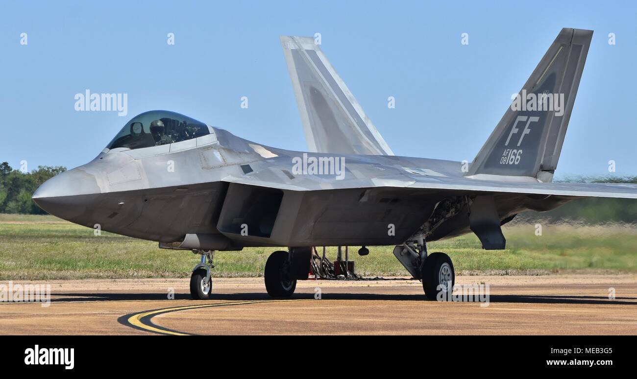 An Air Force F-22 Raptor on the runway at Columbus Air Force Base. This F-22 belongs to the 192nd Fighter Wing from Joint Base Langley-Eustis. Stock Photo