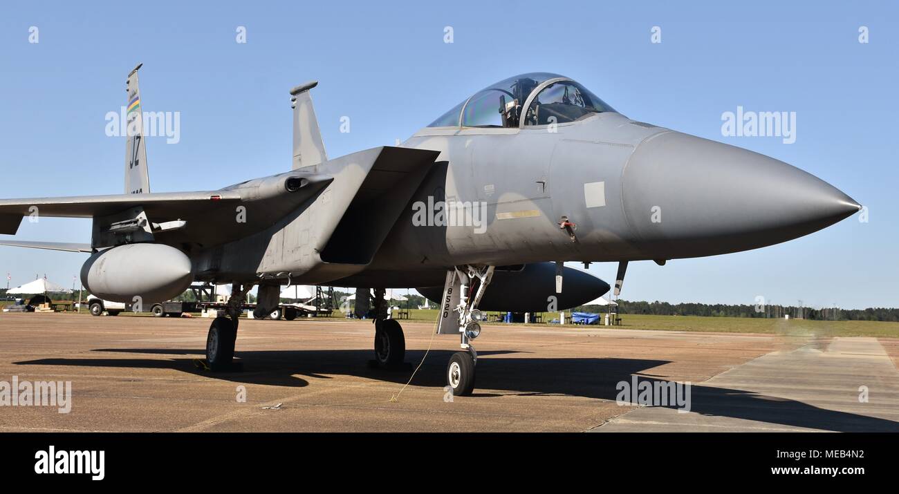 An Air Force F-15 Eagle fighter jet on a runway at Columbus Air Force Base. This F-15 belongs to the Louisiana Air National Guard's 59th Fighter Wing. Stock Photo