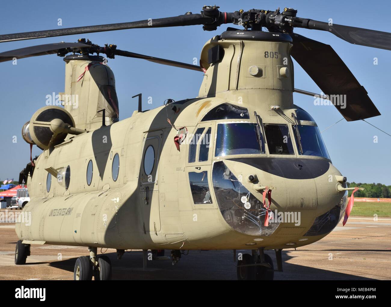 A green U.S. Army CH-47 Chinook transport helicopter on the runway at Columbus Air Force Base. Stock Photo