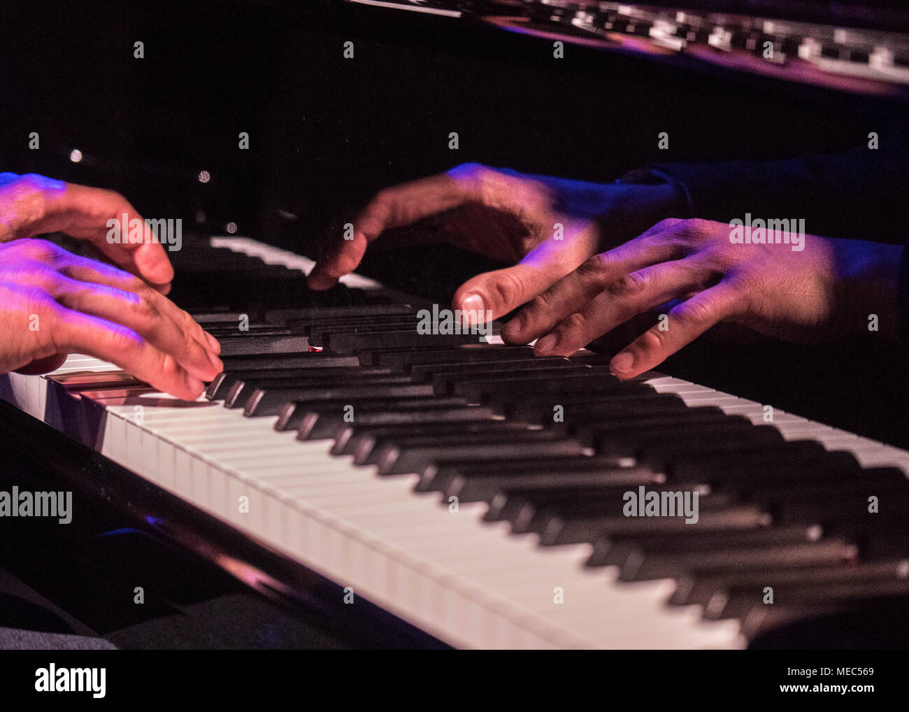 Close enough for jazz. A  close up shot of a pianist's hands playing jazz. Stock Photo