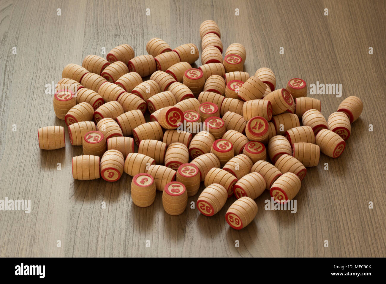 On a wooden table lie kegs of lotto without a bag Stock Photo