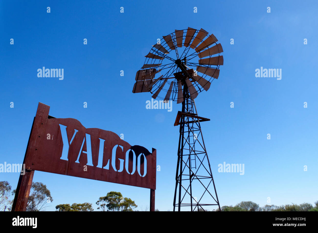 Yalgoo country town sign and windmill, Yalgoo, Western Australia Stock