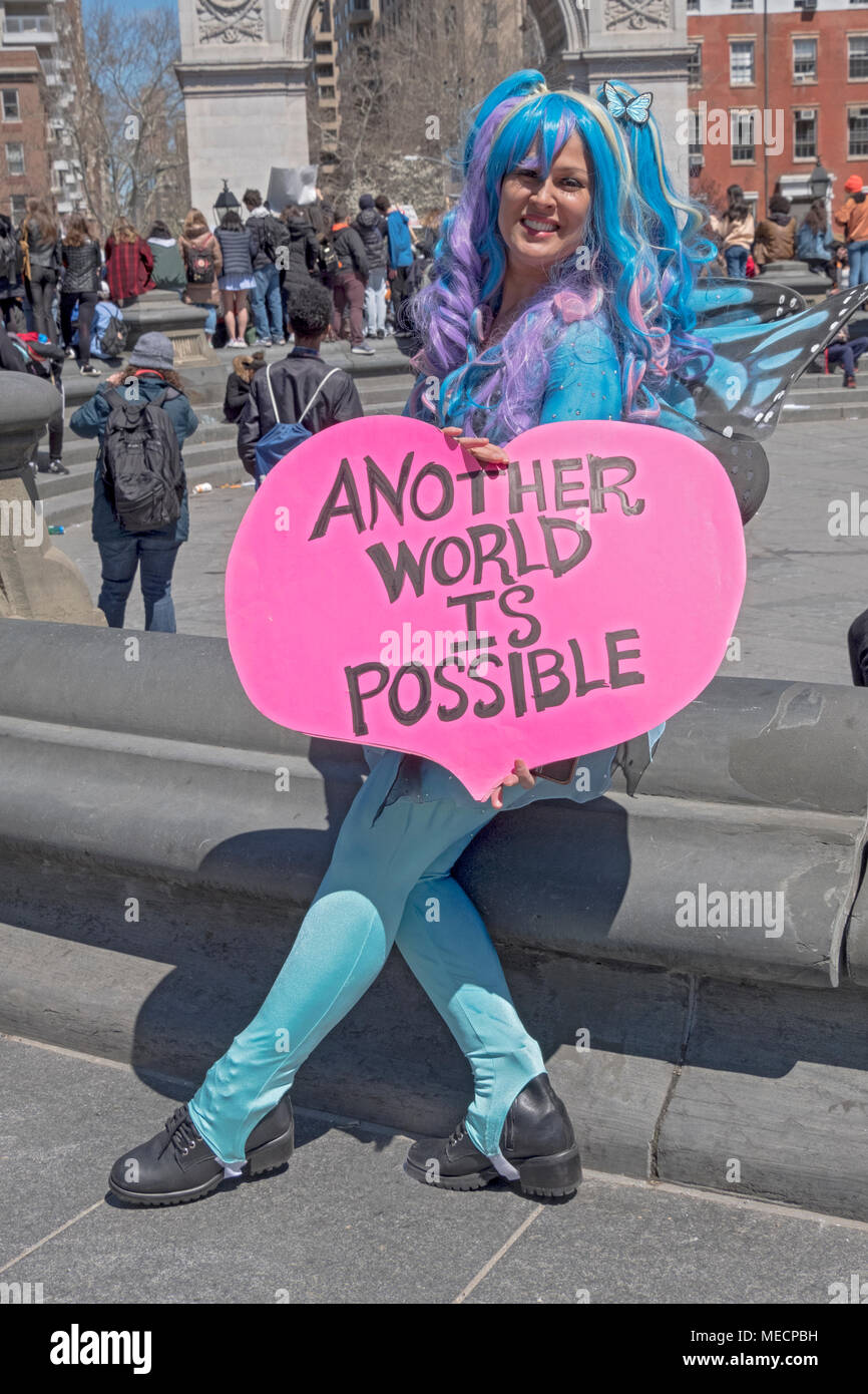 Marni Halasa holding an optimistic sign at the National Schools Walkout teens student rally in Washington Square Park in New York City. Stock Photo