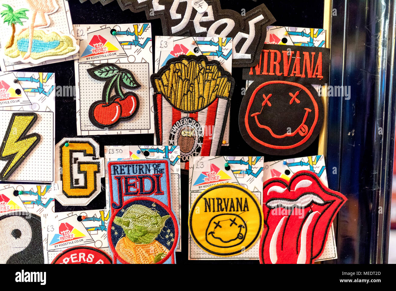 Embroidered vintage Metal Rock Punk Indie Music Band Sew Iron On Patches on display in the UK including Motorhead, ACDC, Nirvana, Rolling Stones and R Stock Photo