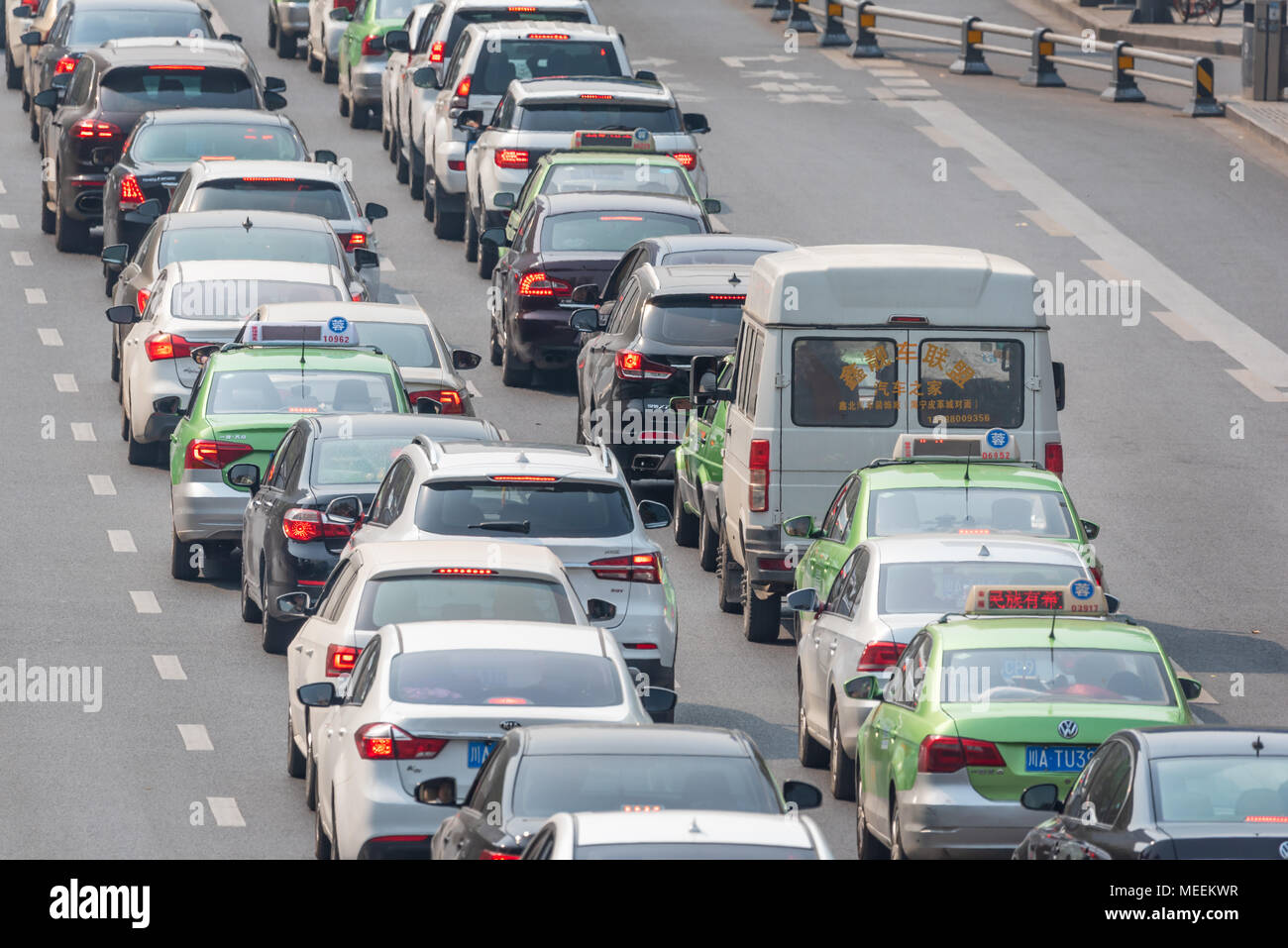 Chengdu, Sichuan Province, China - April 18, 2018 : Two lanes of car traffic in a large avenue Stock Photo
