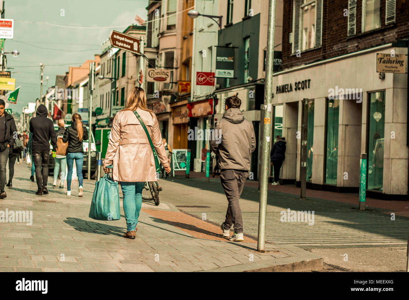 People shopping on Oliver Plunkett Street, one of the city's main streets for stores, street