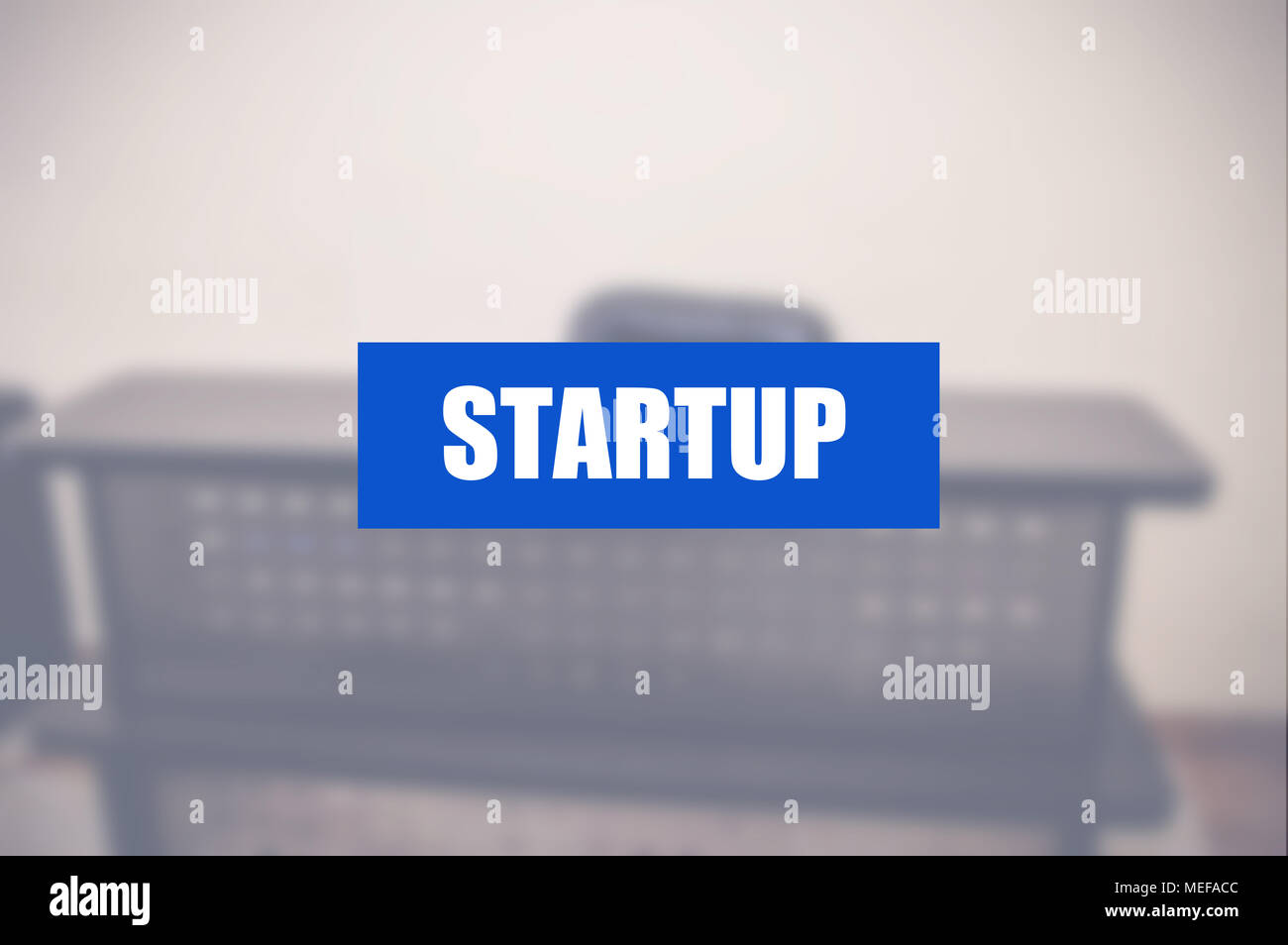 Startup word with business blurring background Stock Photo - Alamy