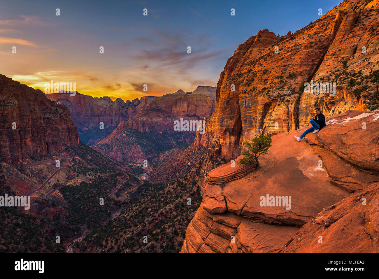 Tourist at the  Canyon Overlook in Zion National Park Stock Photo