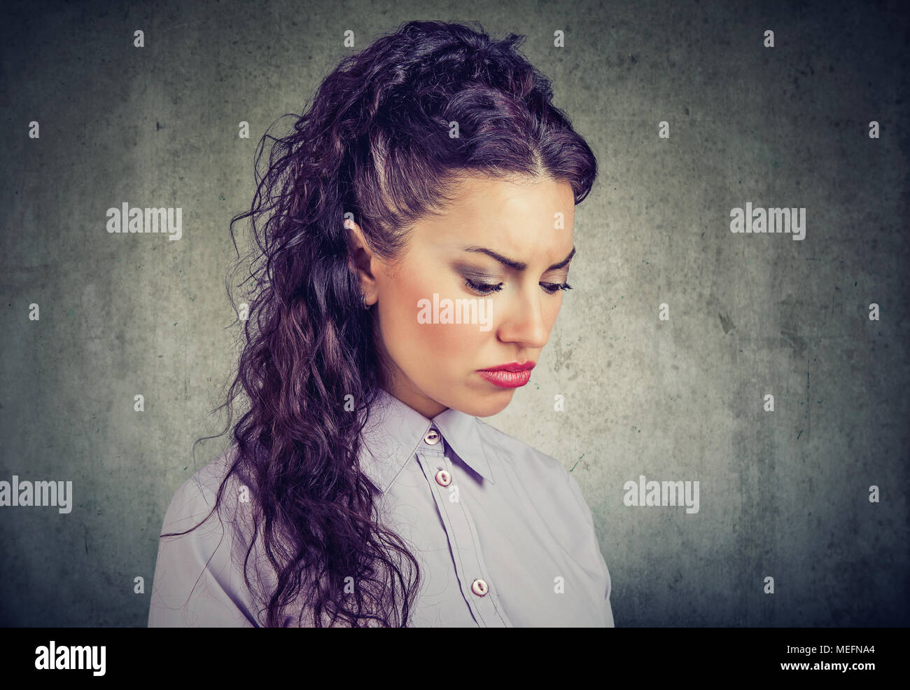 sad woman crying, looking aside on black background, closeup portrait,  profile view Stock Photo - Alamy