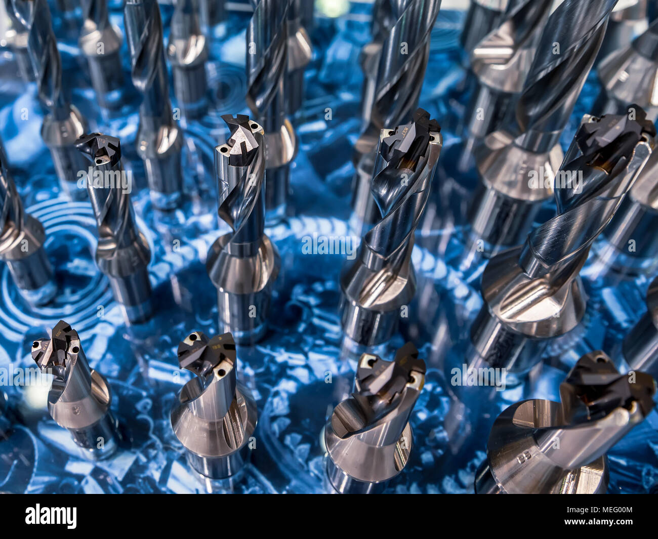 Milling cutters are cutting tools typically used in milling machines or machining centres to perform milling operations Stock Photo