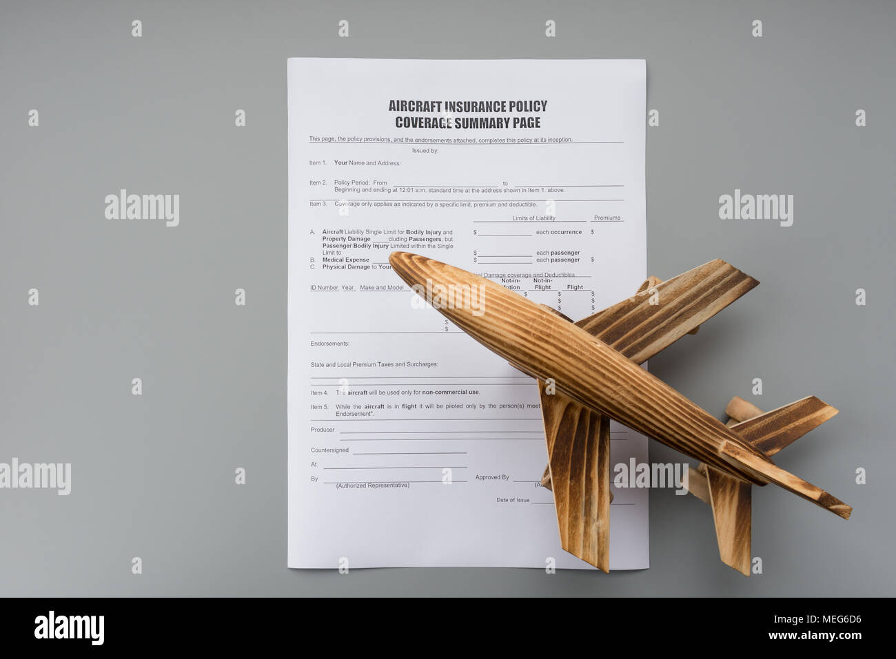 aircraft insurance policy coverage summary and an airplane model